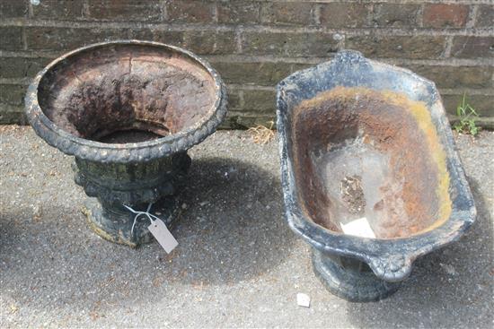 2 black painted cast iron planters